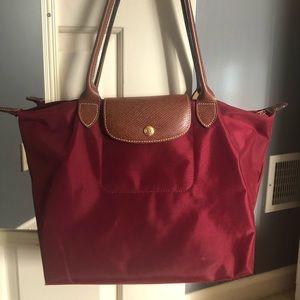 Maroon Longchamp Bag purchased in Rome, Italy.